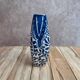 Small antique vase in blue and white earthenware, hand-painted – oriental decoration.