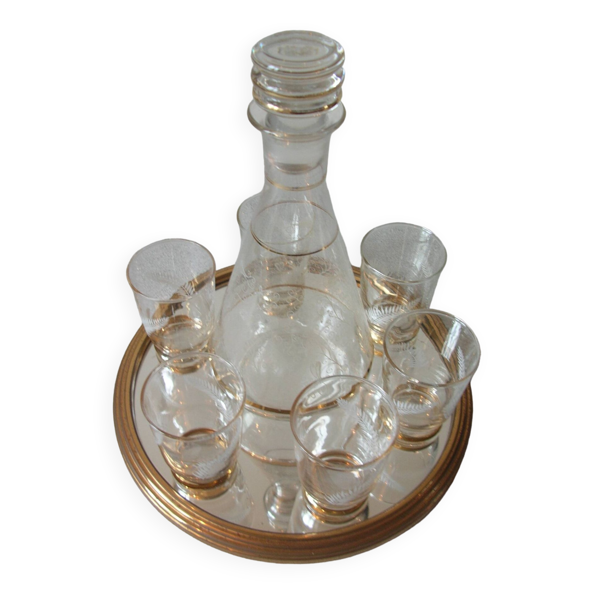 Old glass carafe liquor service with gilding vintage ice mirror tray