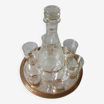 Old glass carafe liquor service with gilding vintage ice mirror tray