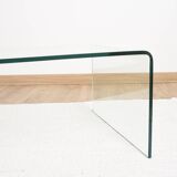 Transparent tempered glass coffee table.