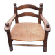 Low straw fireplace armchair in Dudouyt style