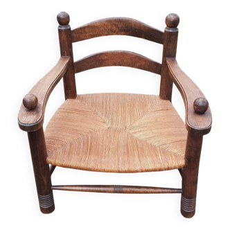 Fauteuil bas paillé de cheminée style Dudouyt