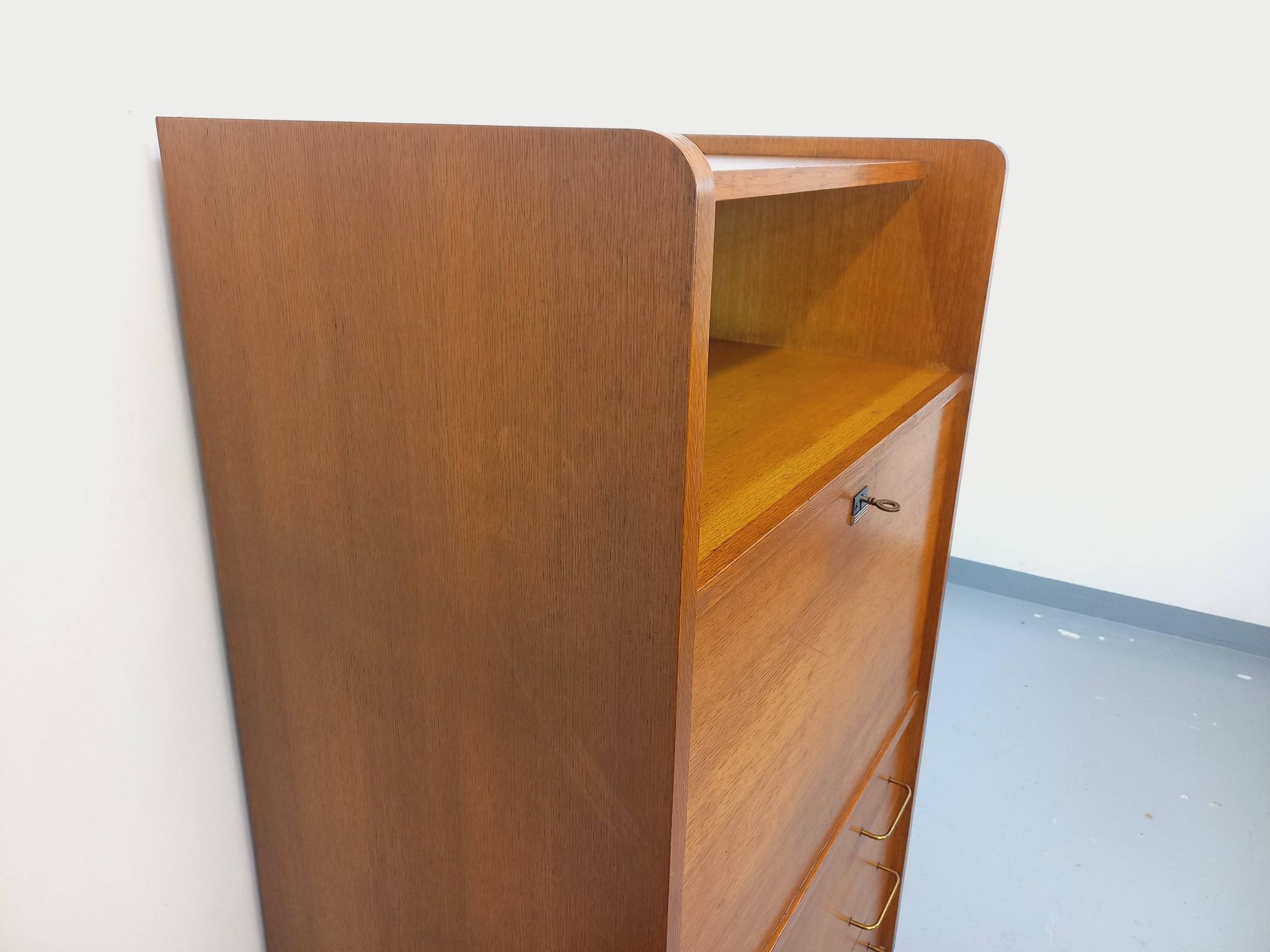 Vintage oak secretary storage furniture from the 1950s and 60s.