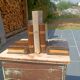 Wooden trompe-l'œil bookends with a book and box