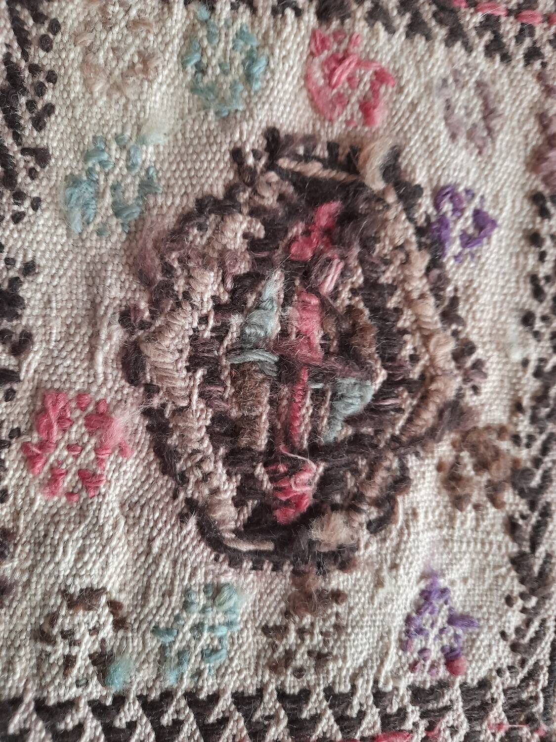 Antique embroidered kilim with 16 medallions from Turkey or the Balkans, c. 1950.