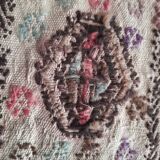 Antique embroidered kilim with 16 medallions from Turkey or the Balkans, c. 1950.