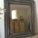 Antique patinated wood mirror