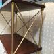 Mahogany and gold metal shelf