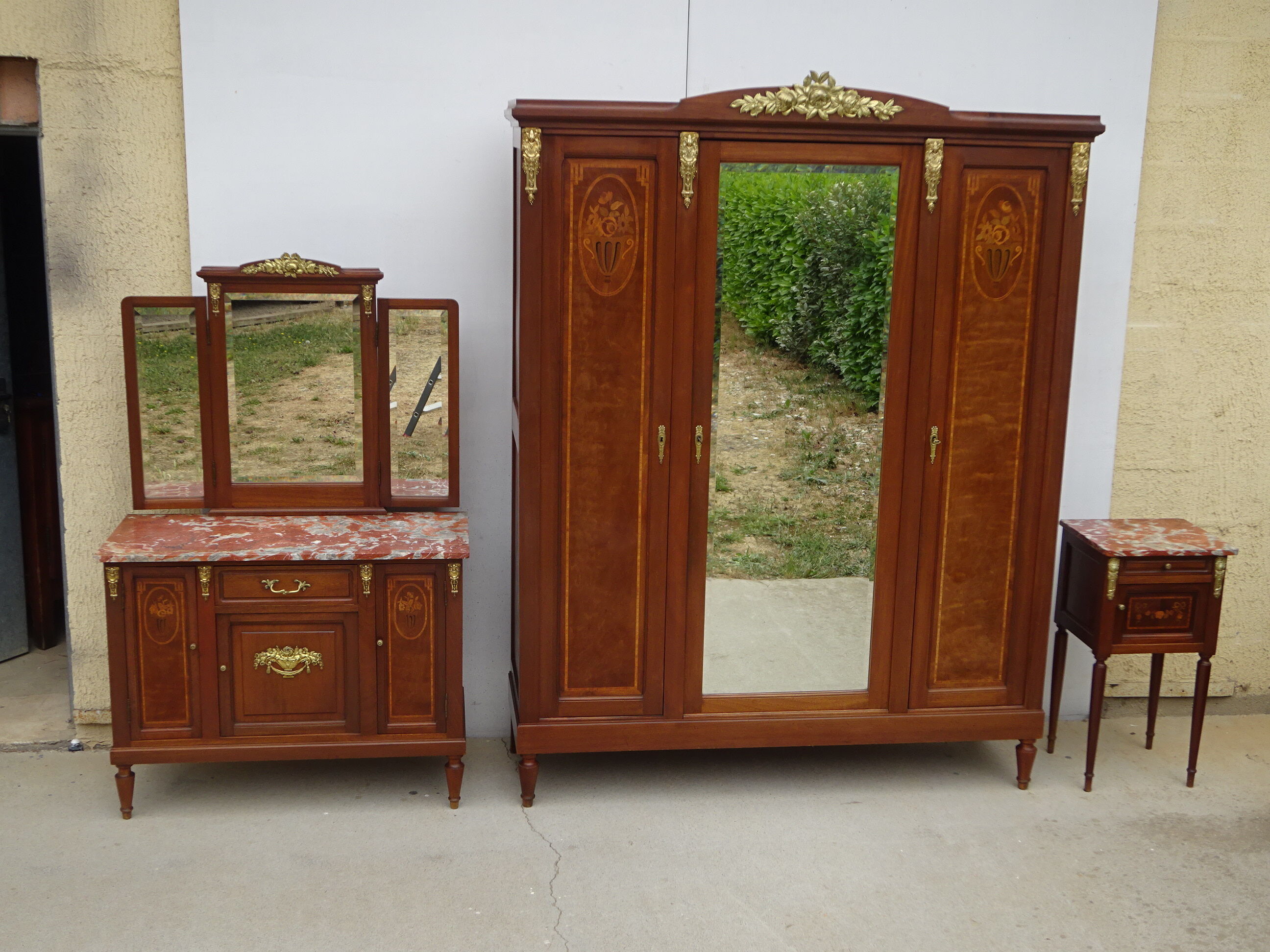 Louis XVI style wardrobe late nineteenth century, mahogany and marquetry