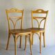 2 bistro chairs from 1905 by KOHN No. 187, wooden seats with 5 fleur-de-lis motifs