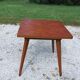 Extendable table with compass legs