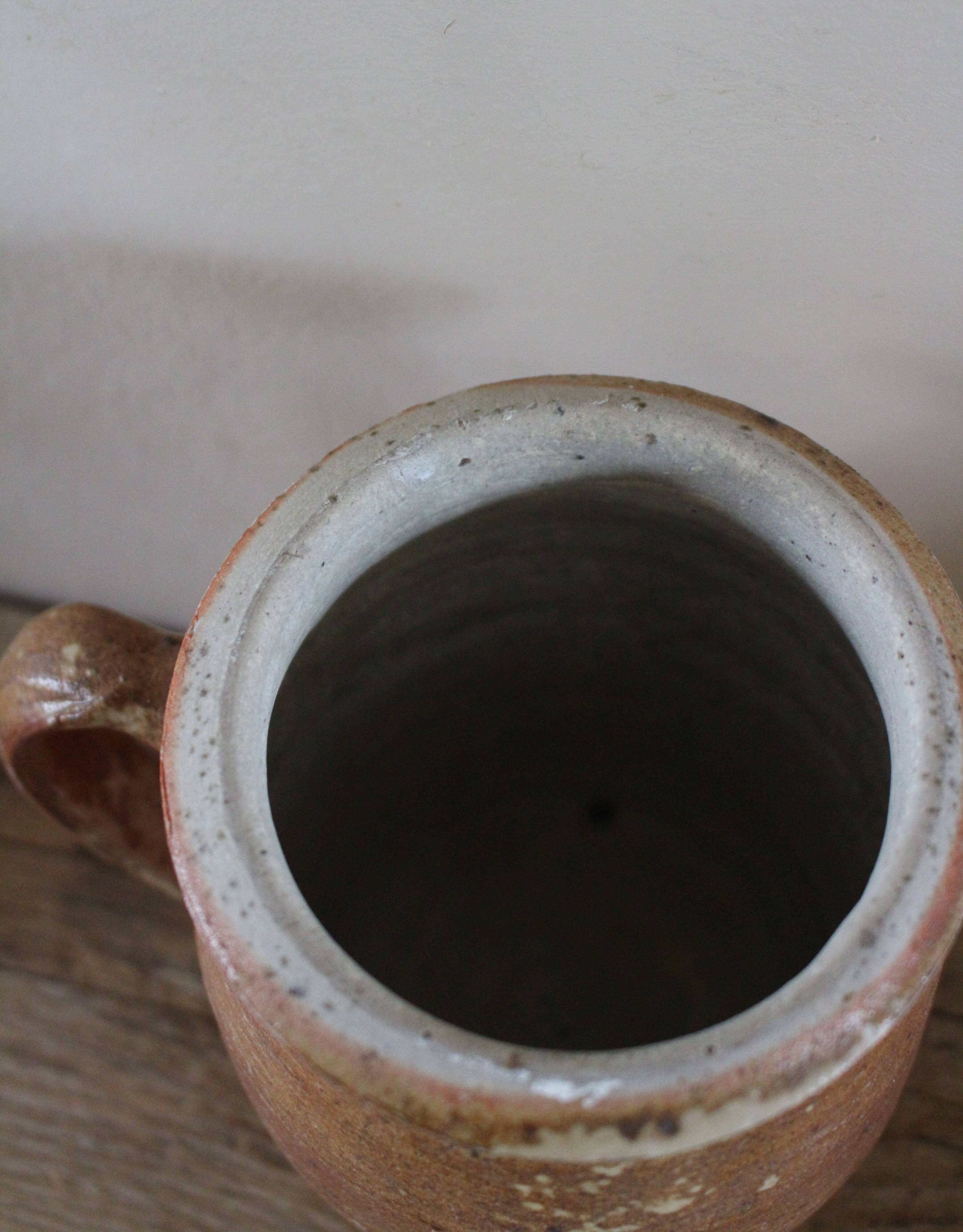 Round-handled terracotta pot vase