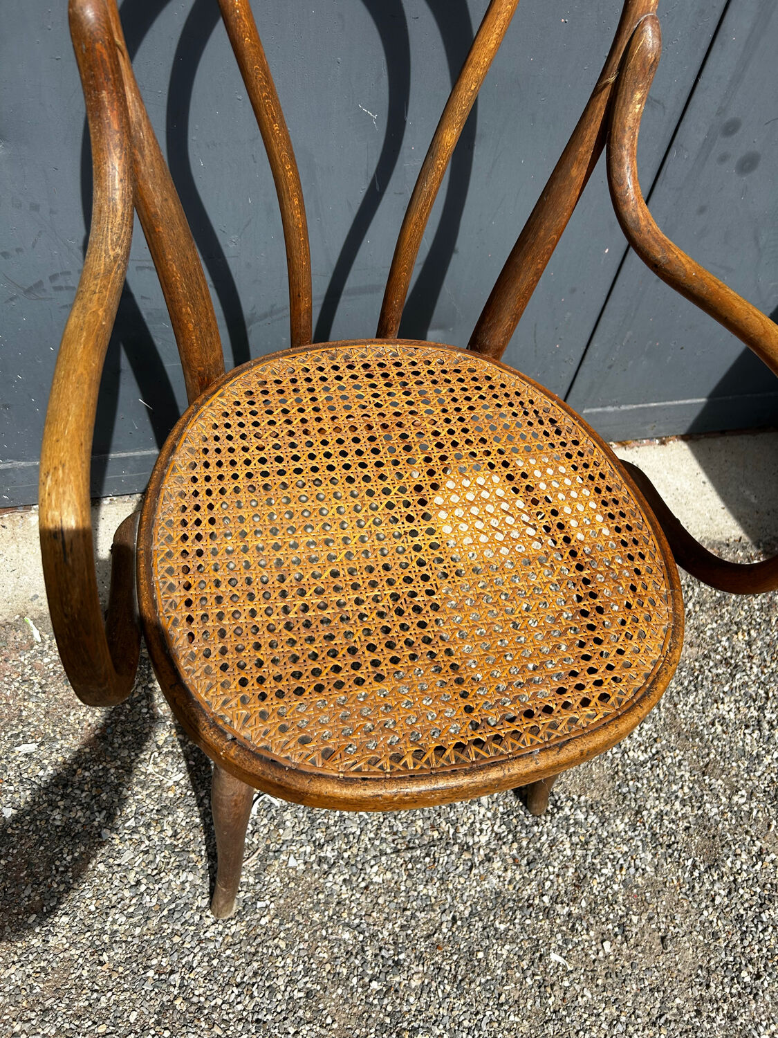 Fauteuil Thonet bois courbé et cannage – modèle bistrot