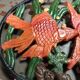 Dessous de plat en fonte poissons
