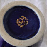 Revol porcelain vase, showcase object, romantic decor, blue background, golden handles