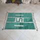 Beni Ourain Berber rug made of natural wool, traditionally handwoven.