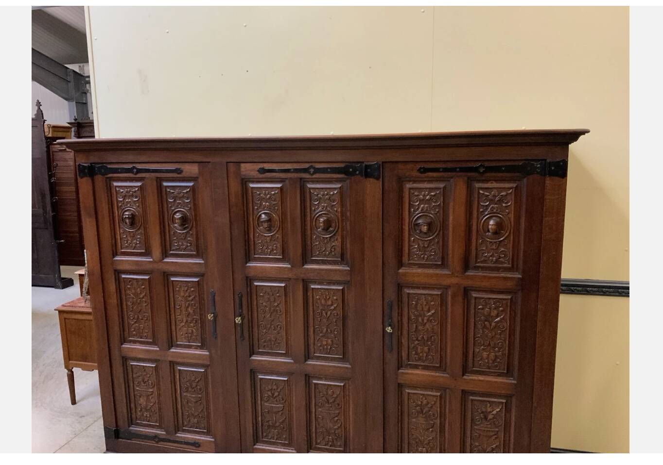 Antique neo-Gothic wardrobe with linen drawers.