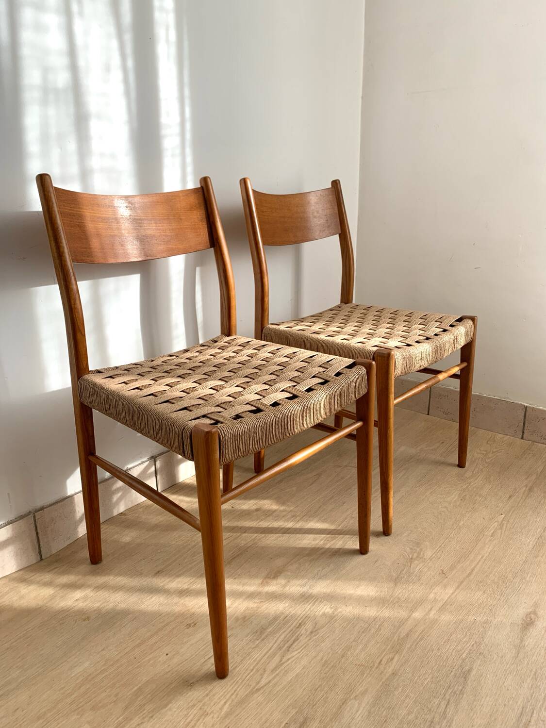 Pair of Scandinavian teak and rope chairs