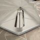 Pair of Art Deco wall sconces in plaster and pressed glass.