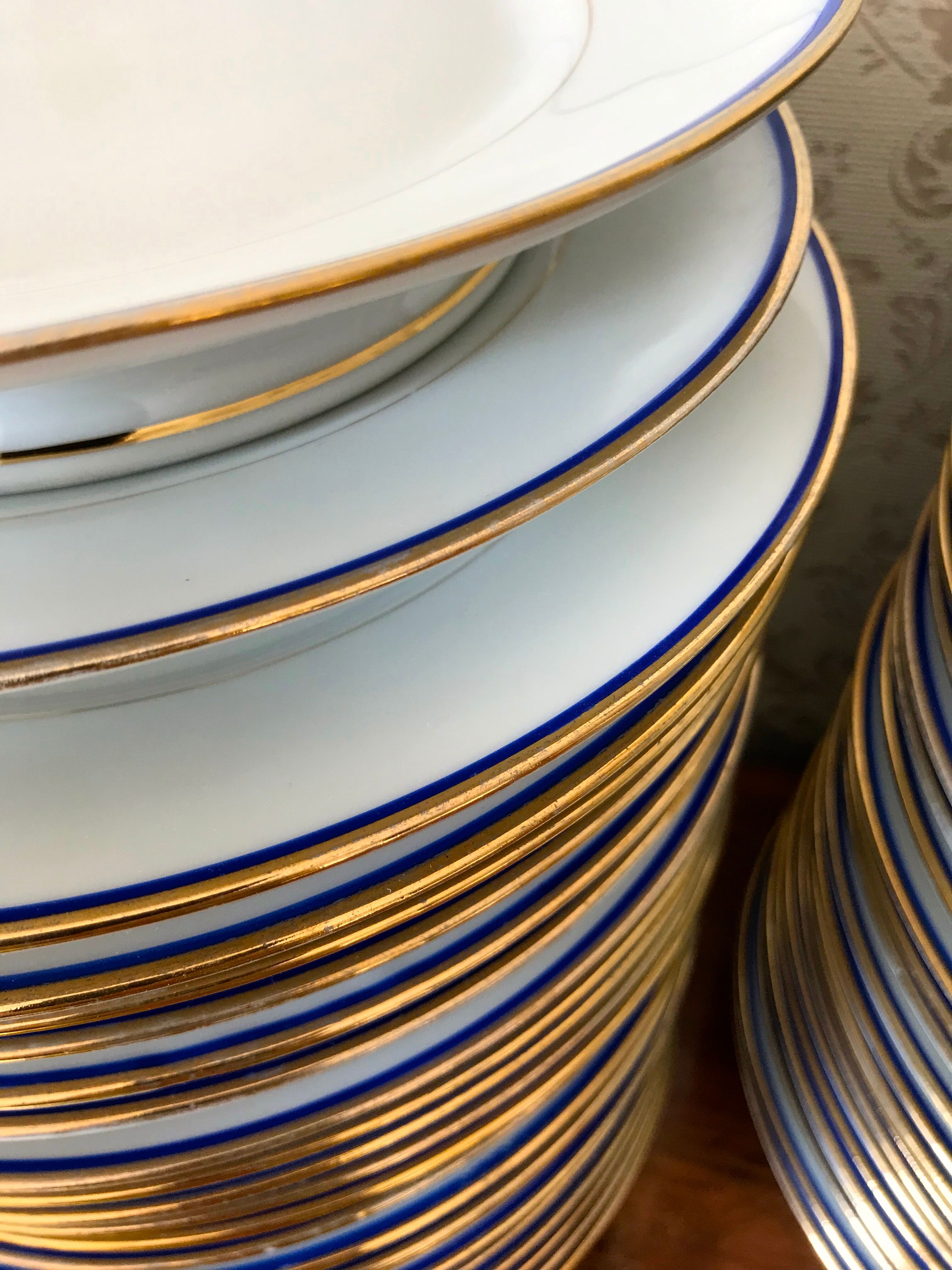 table service art deco limoges porcelain white border blue and gold 61 pieces signed