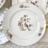 8 flat plates in Céranord porcelain, bird of paradise motif, "Regence" model