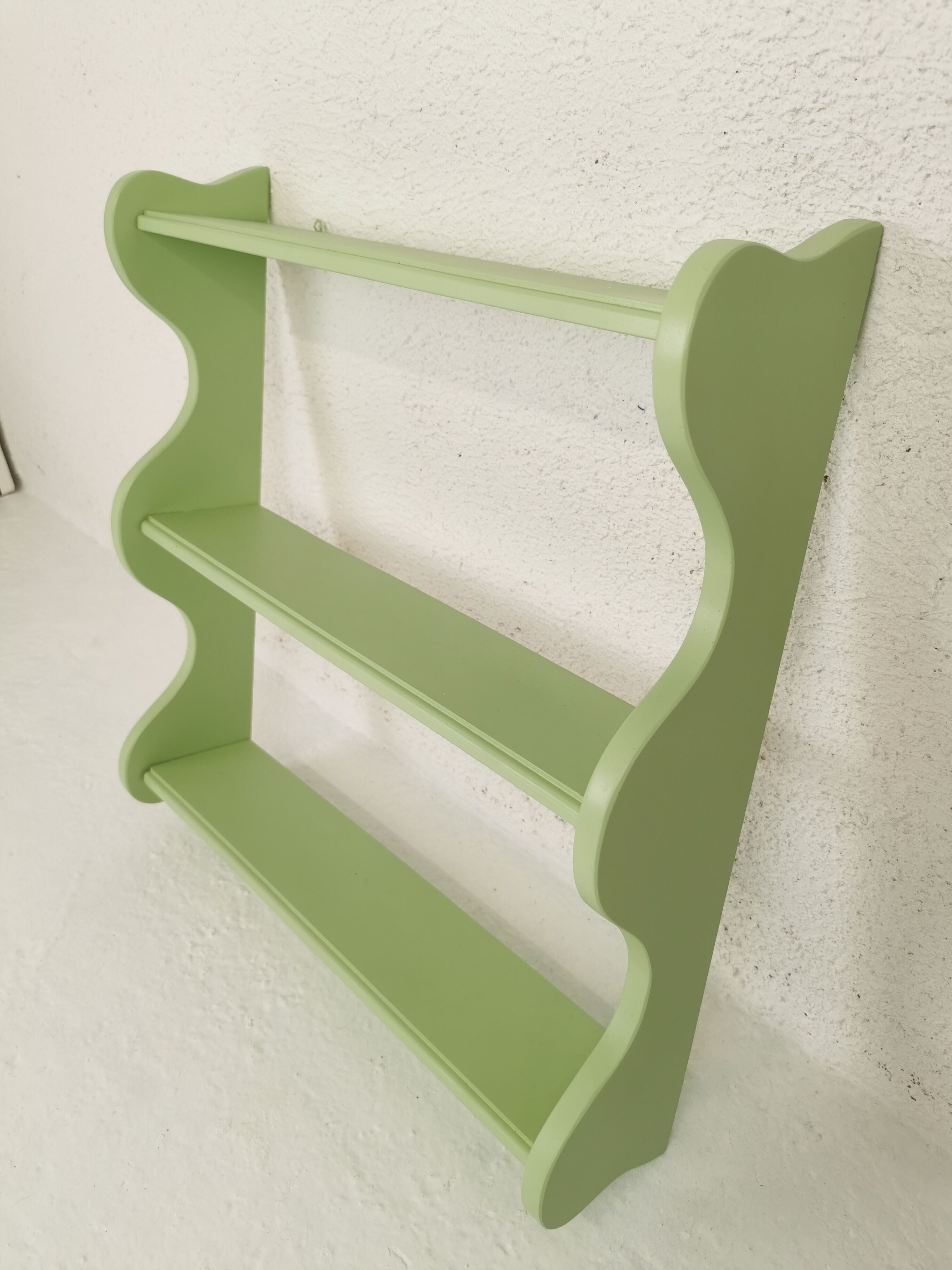 Corrugated wall shelf