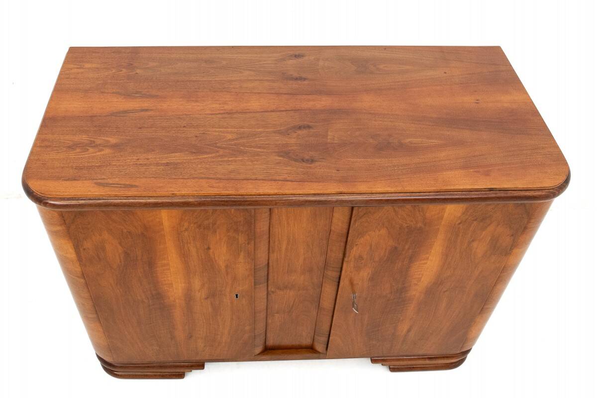 Art Deco style walnut chest of drawers, Poland, 1950s.