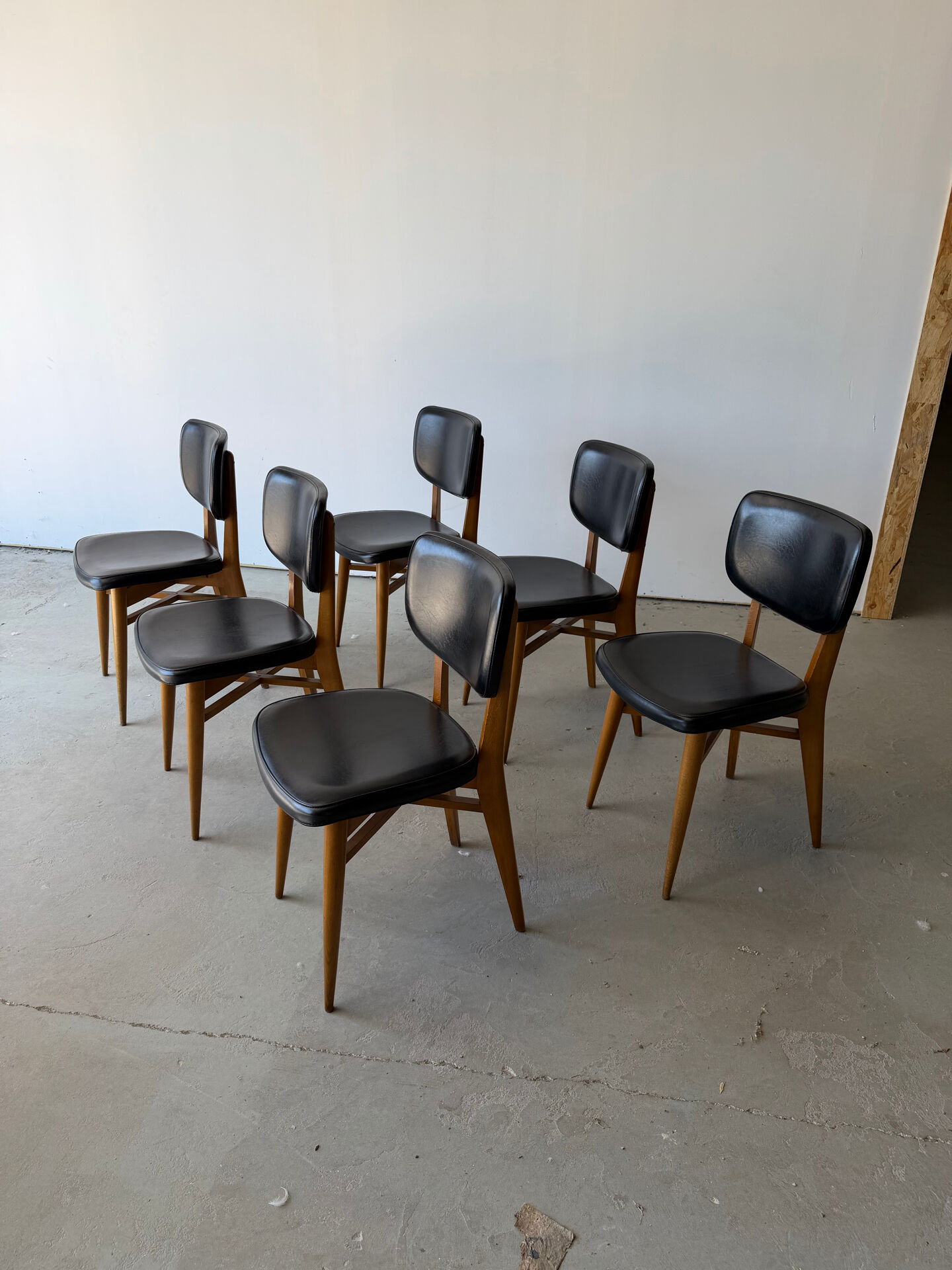 Set of 6 Scandinavian design chairs in solid beech and black Skai.
