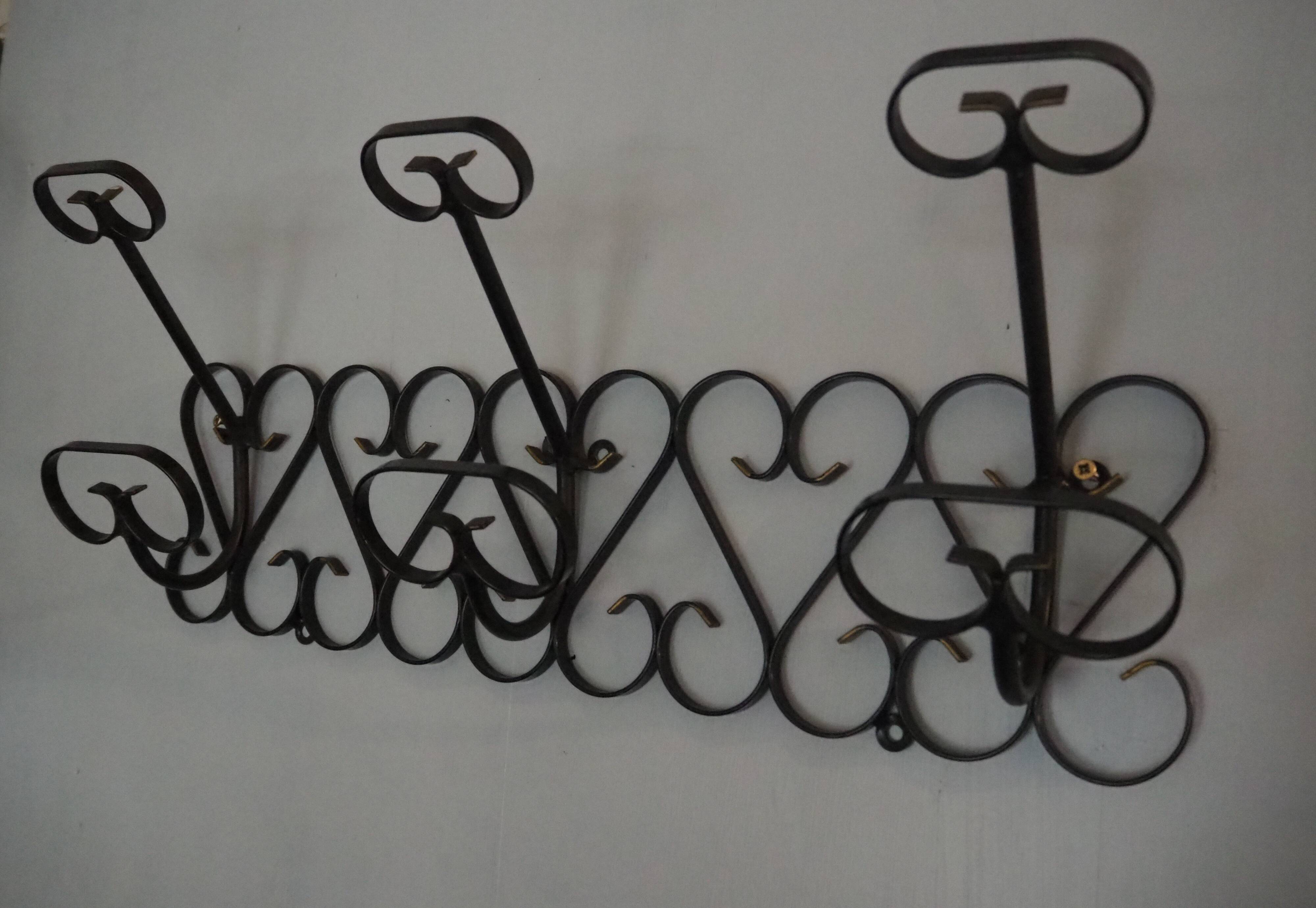 1970s wrought-iron wall coat holder