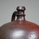 Large stoneware jar from Normandy with lustrous burgundy glaze, from the 1920s-30s.
