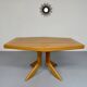 Ancienne table en bois massif octogonal a rallonge design Girsberger