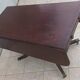 19th-century English style mahogany drop-leaf table.