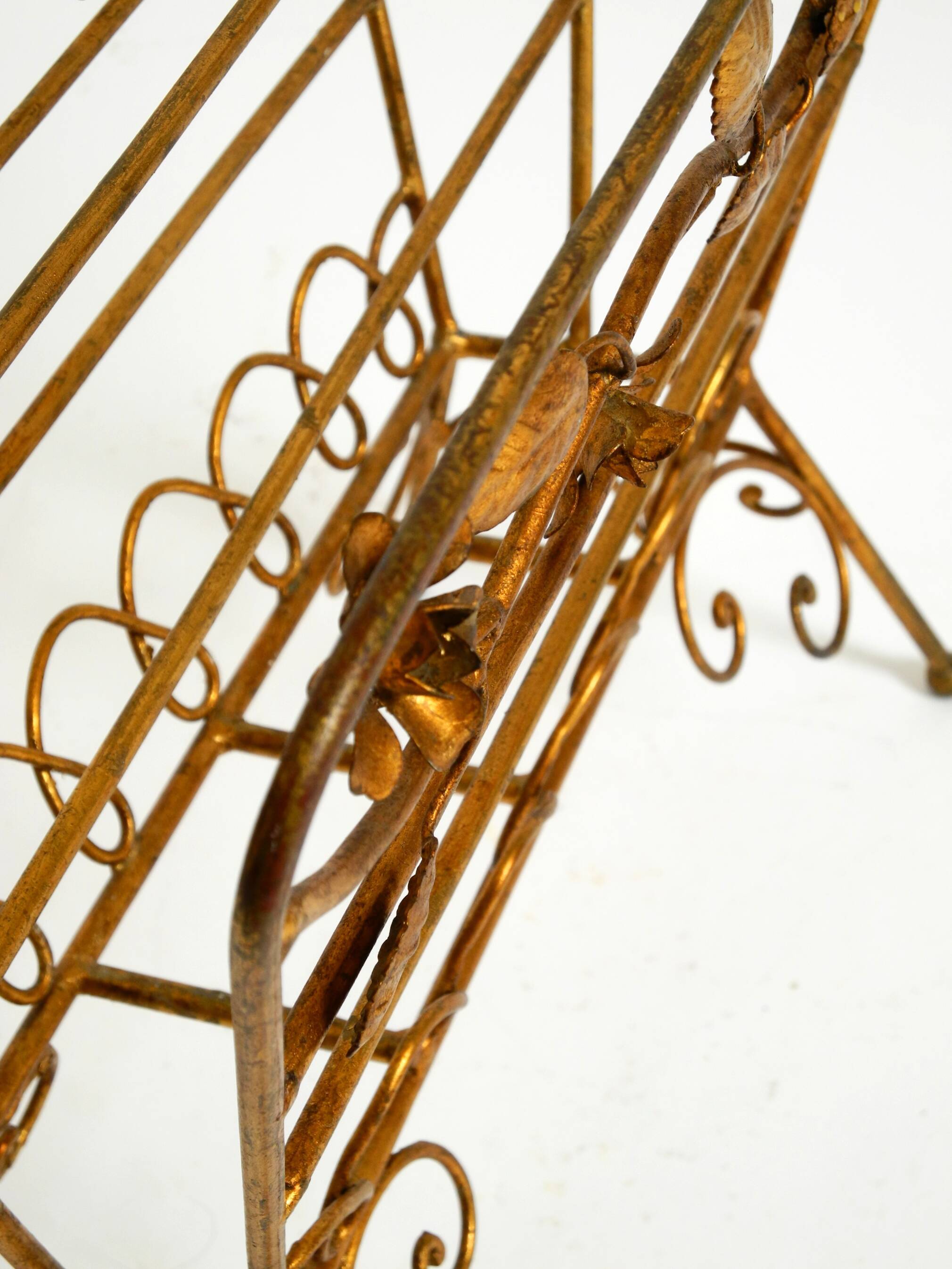 Extraordinary mid-century newspaper and magazine rack with a gilded metal