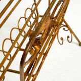 Extraordinary mid-century newspaper and magazine rack with a gilded metal