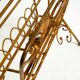Extraordinary mid-century newspaper and magazine rack with a gilded metal