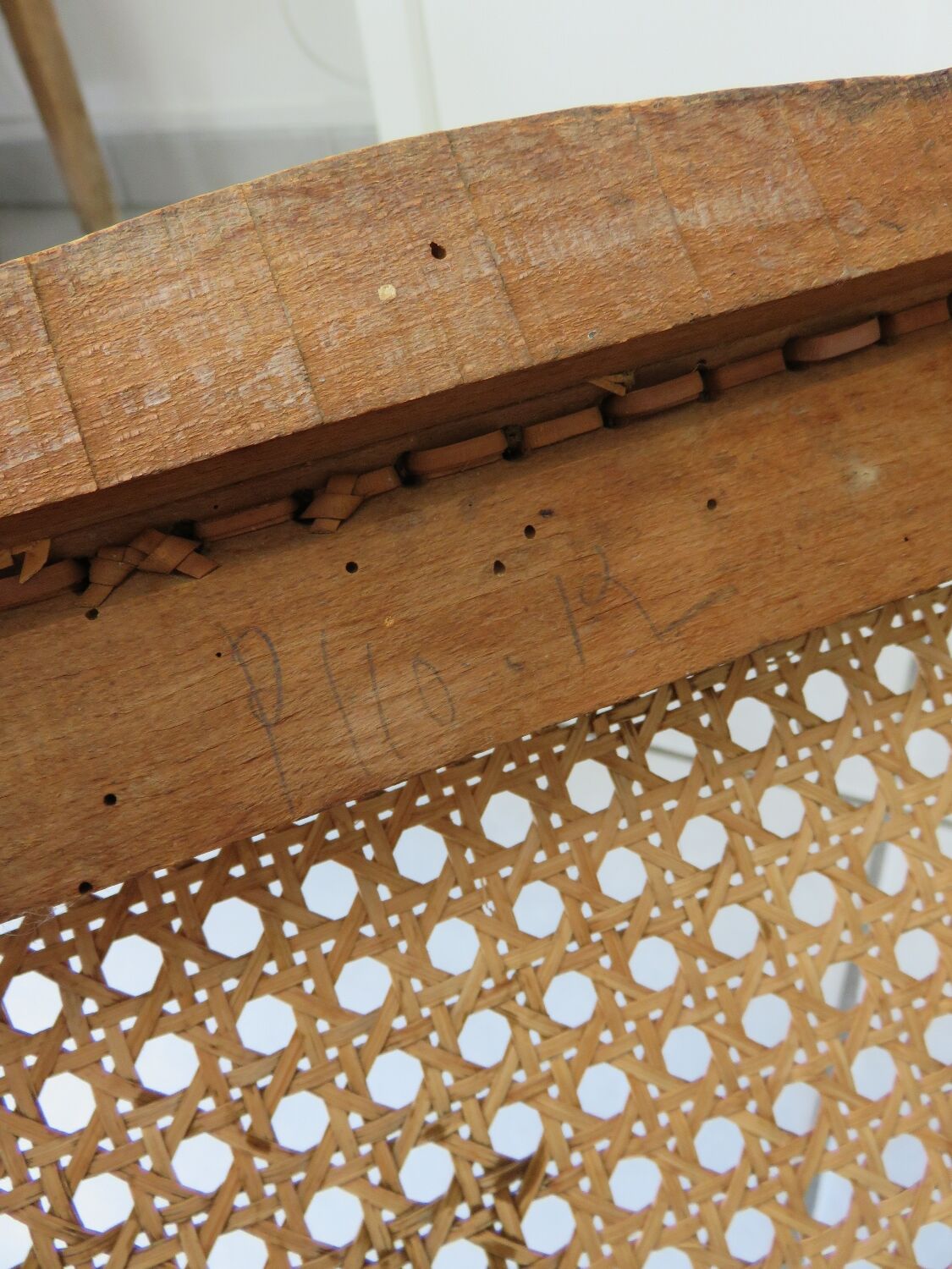 Antique solid wood chair with caning, country house style.