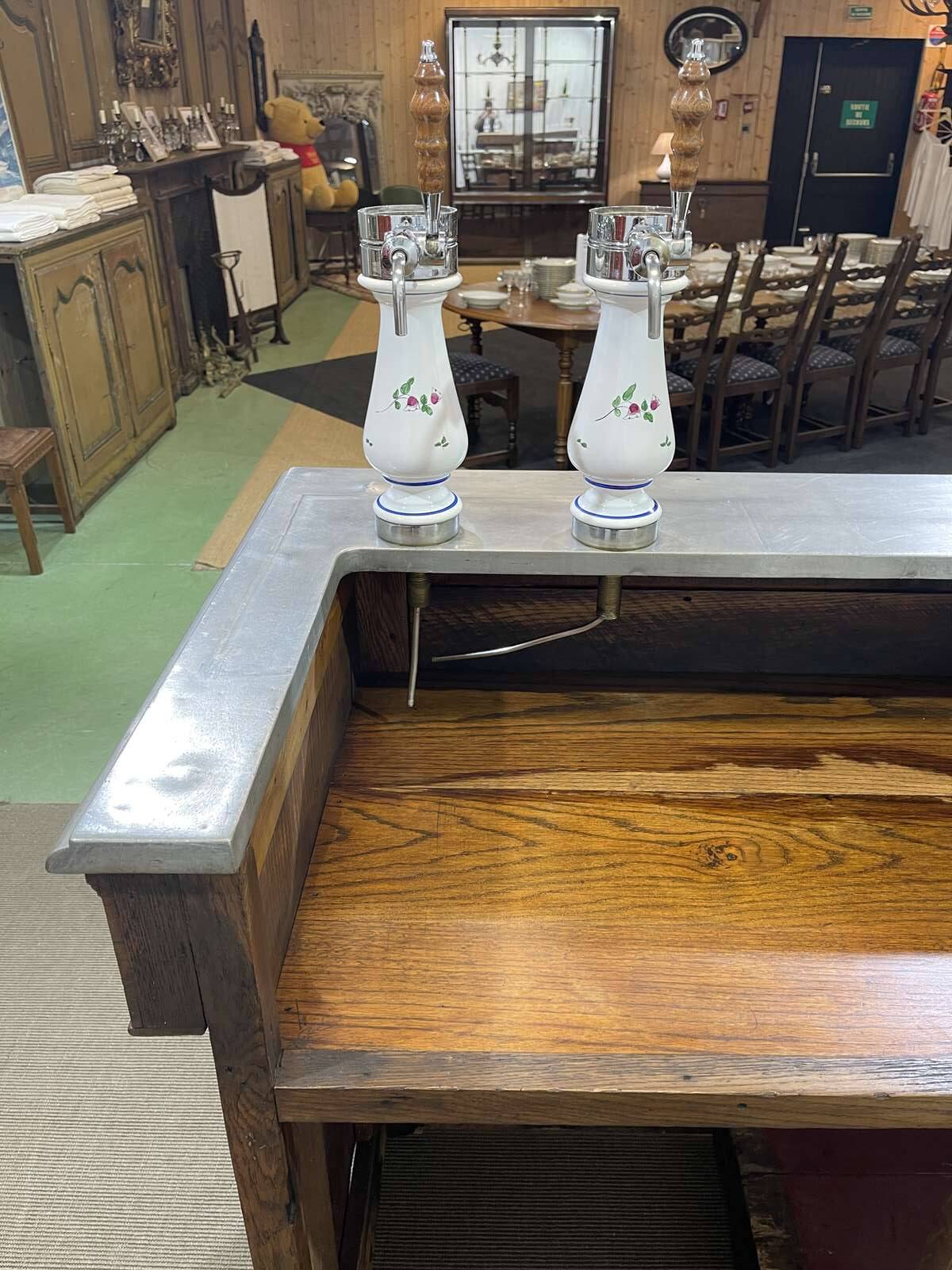 Bar counter in oak, zinc, and white marble from the early 20th century.