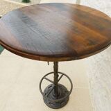 Unique bistro table with its adjustable industrial cast iron leg