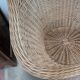 Large woven rattan armchair