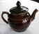 Ancienne cafetière en céramique vernissée marron