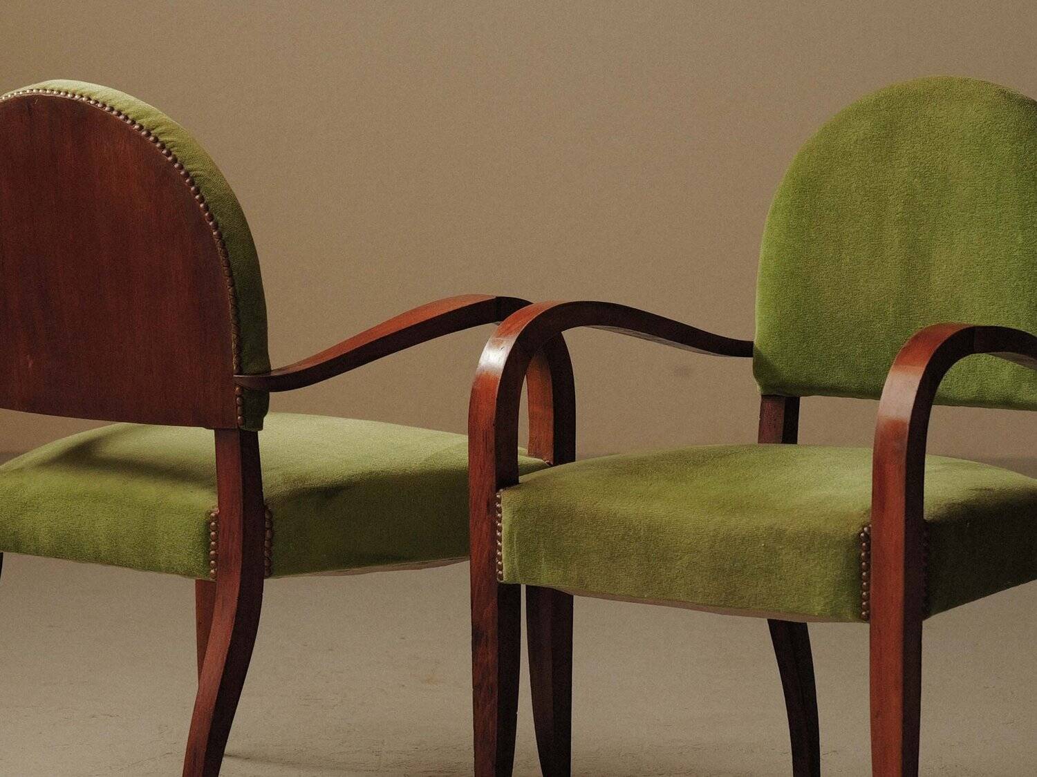 Pair of Art Deco armchairs in mahogany, circa 1930.