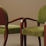 Pair of Art Deco armchairs in mahogany, circa 1930.