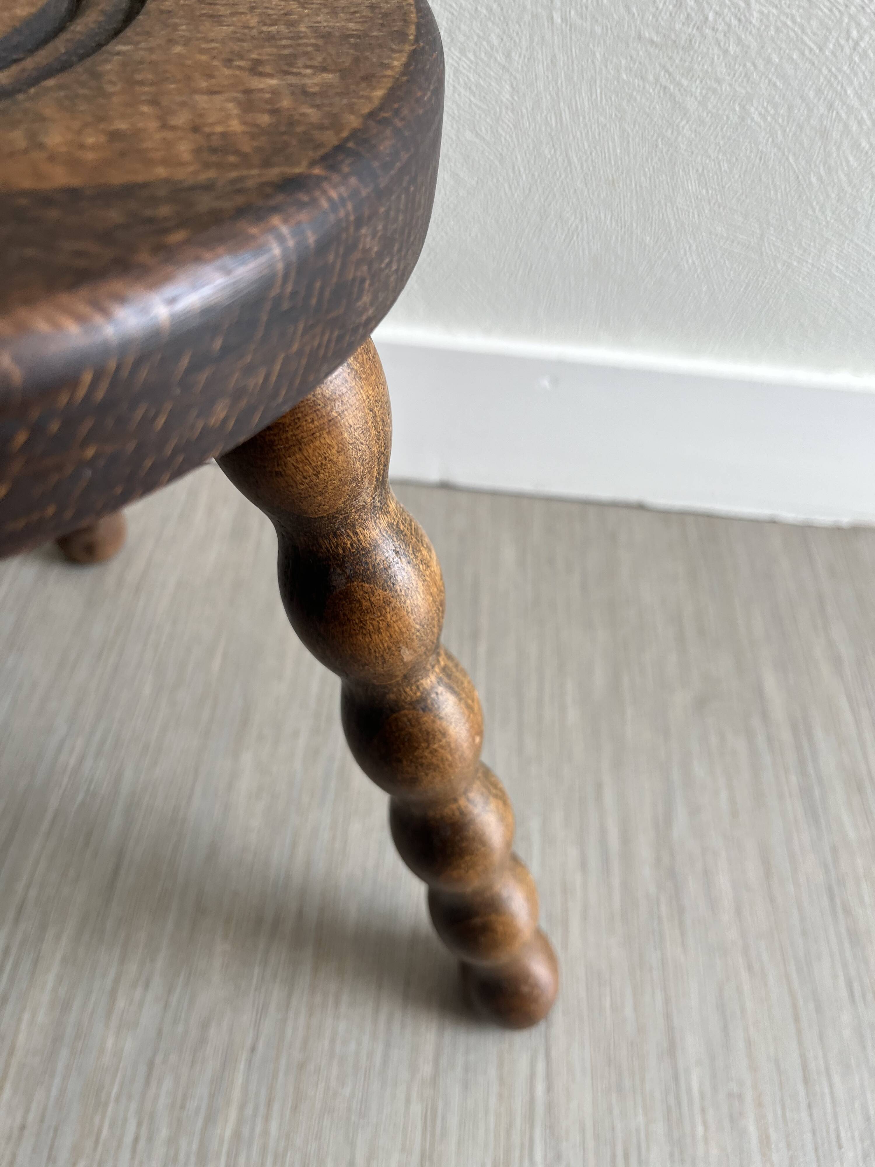 Wooden tripod stool