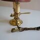 hot water bottle lamp with 2 bronze lights and burgundy sheet metal lampshade