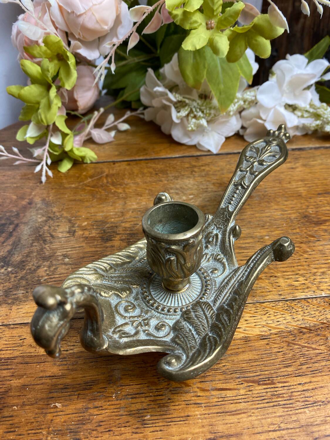 Hand candlestick, peacock shape, in bronze