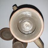 Teapot in ancient sandstone
