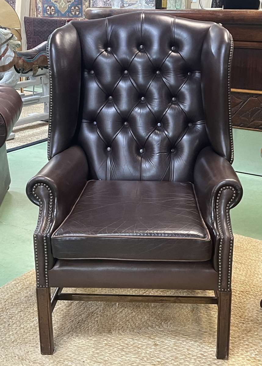 Chesterfield armchair with brown leather ears from the 1990s in very good condition