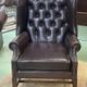 Chesterfield armchair with brown leather ears from the 1990s in very good condition