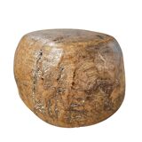 A substantial hand-hewn wooden bowl carved from a single burl section