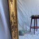 Antique Louis Philippe style gilded mirror decorated with floral motifs